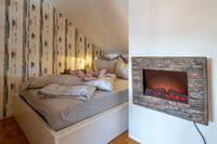 FeWo Schlafecke mit Doppelbett im Wohnzimmer